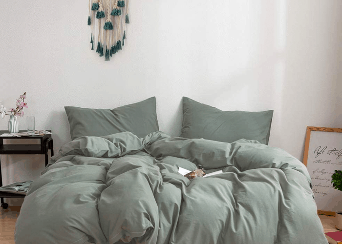 bedding with white walls